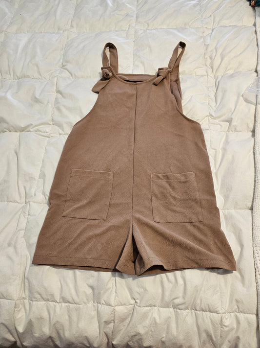 Small beige romper, soft material